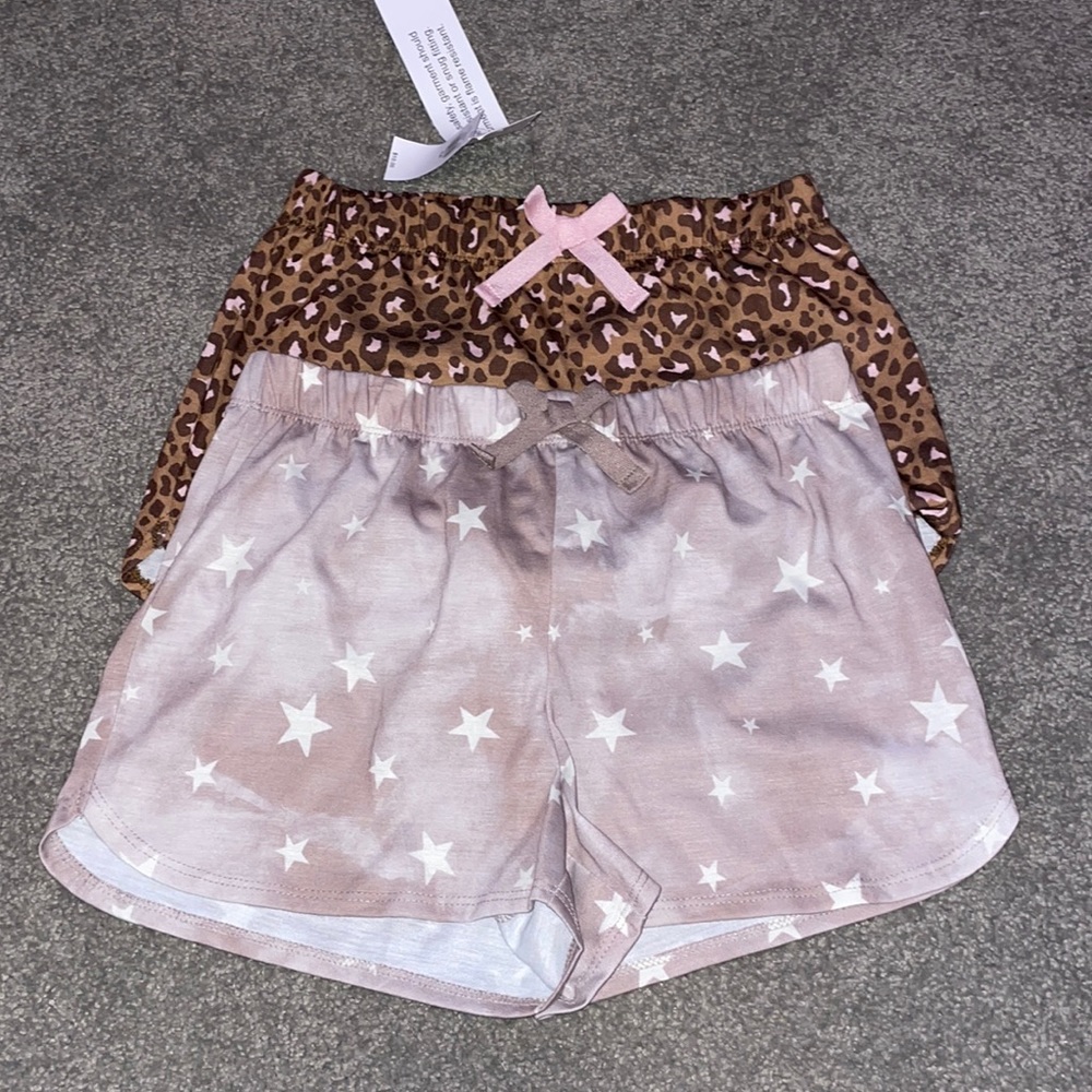 old navy kids medium (8) sleep shorts. Leopard print, and starry pink